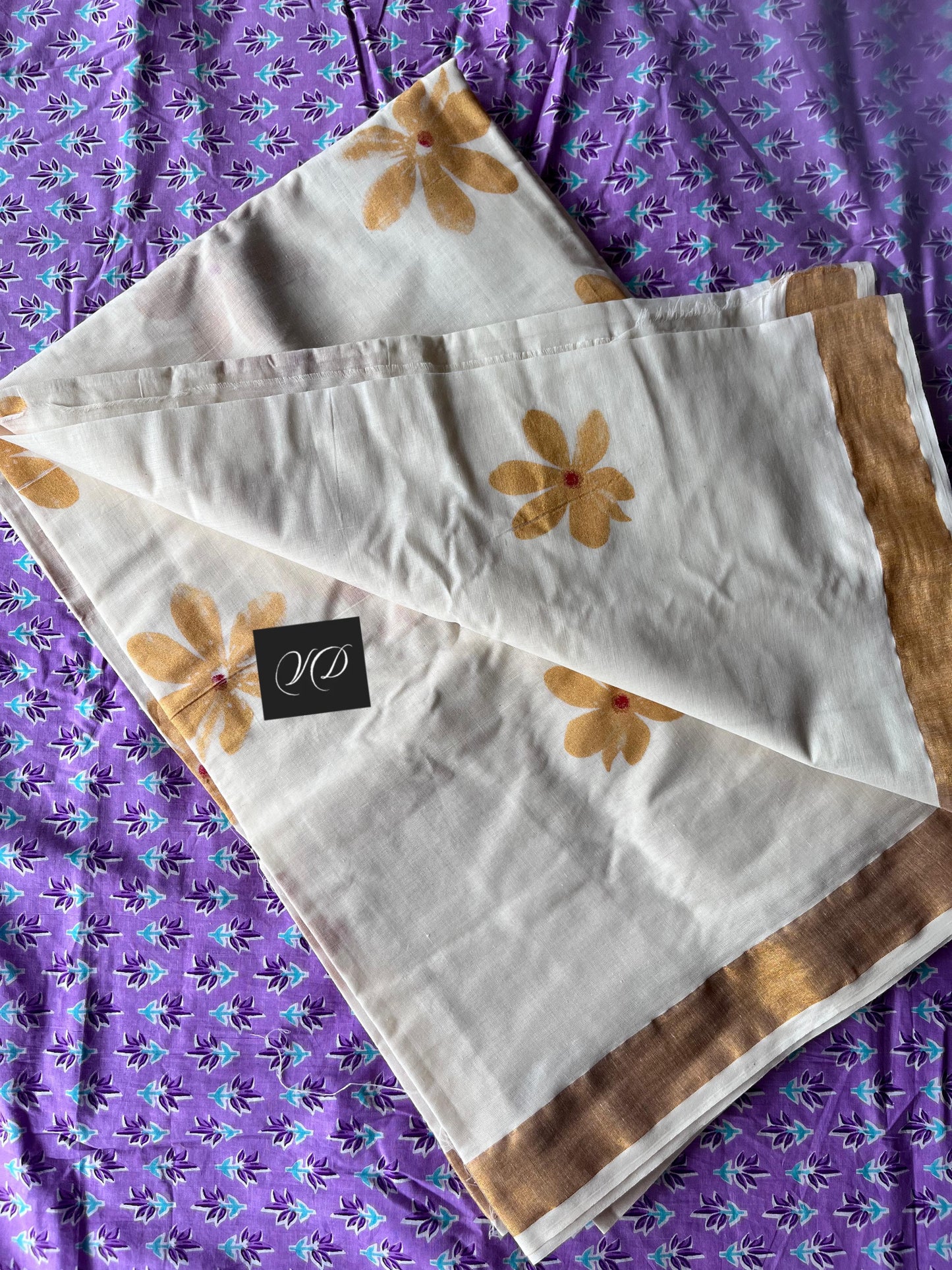 Kerala cotton saree with gold flowers