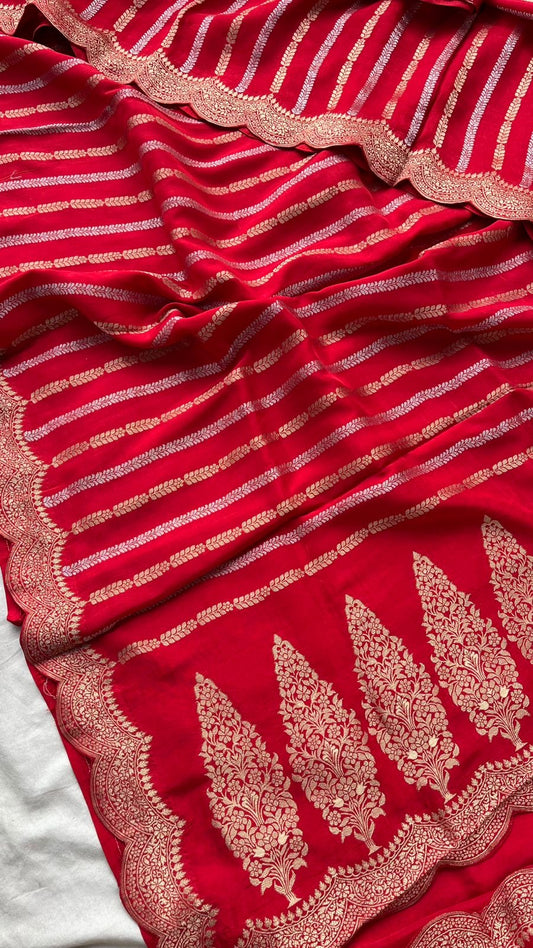 Pure banarasi munga silk saree with zari stripes and scalloped border