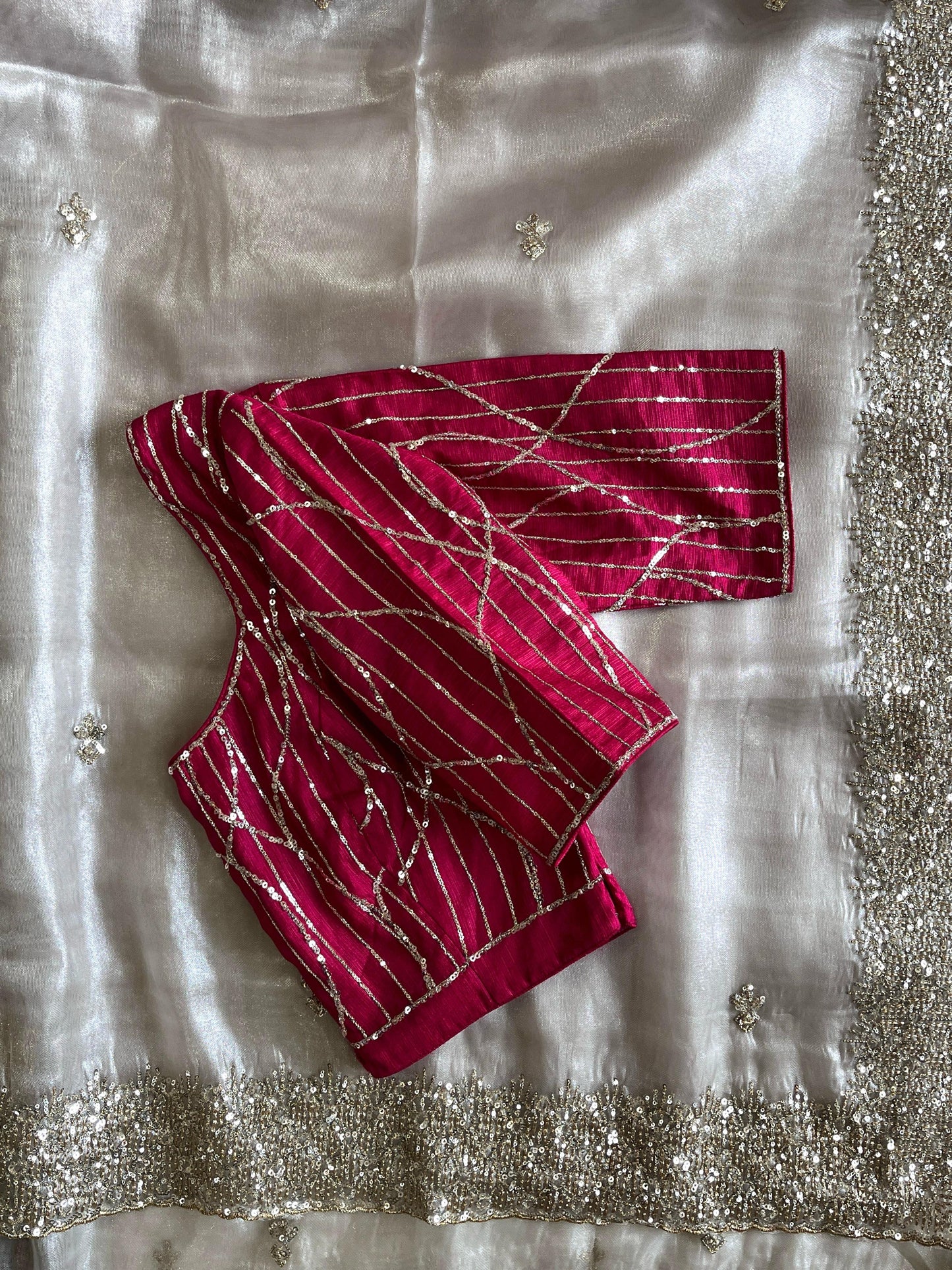 Silver tissue saree with handwork and pink blouse