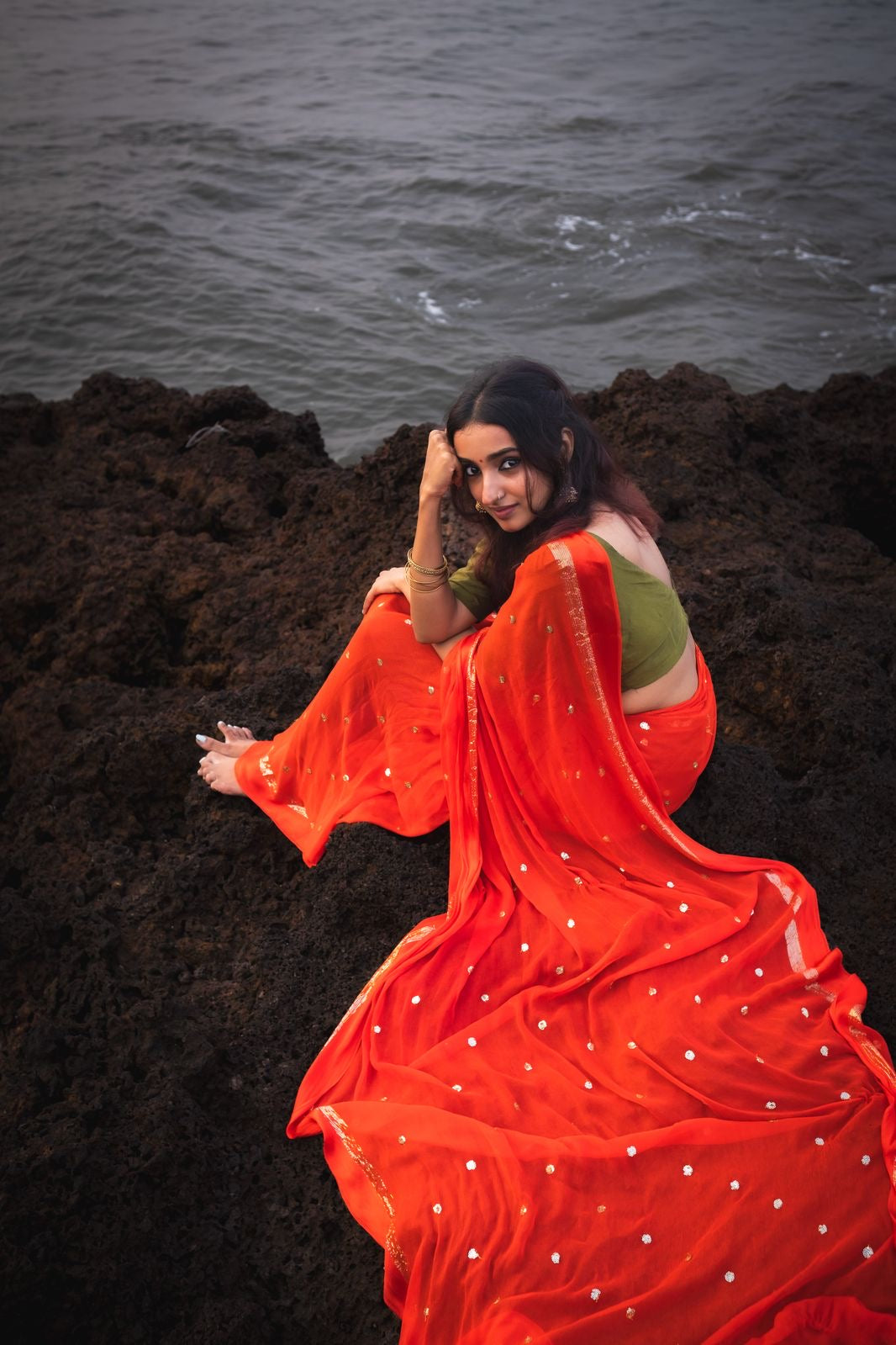 Viscous georgette with satin borders and round sequins buttas