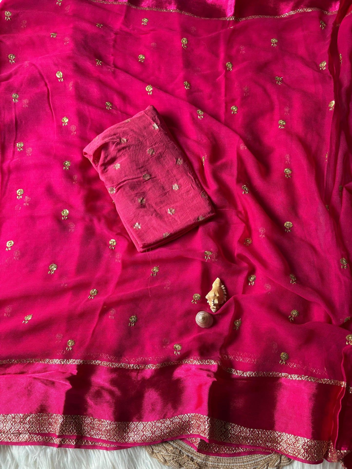 Pure georgette viscous saree with rich satin border and tiny flower buttas
