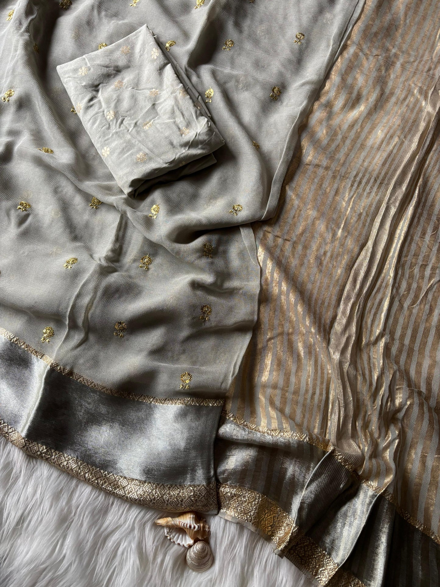 Pure georgette viscous saree with rich satin border and tiny flower buttas