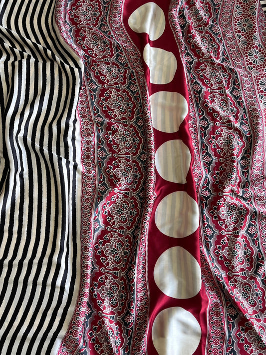 Soft and flowy crepe silk saree with stripes and ajrakh pallu