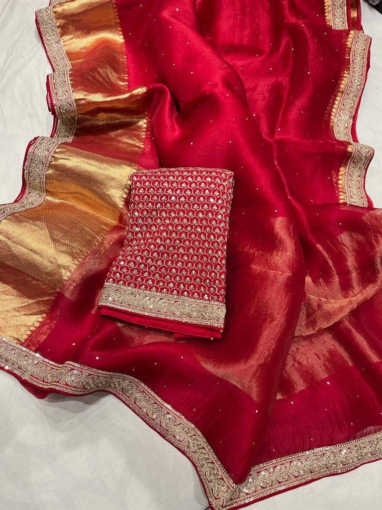Pure organza saree with kanchi zari border and heavy blouse