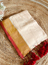 Soft mul cotton saree with peach base and beautiful red zari border