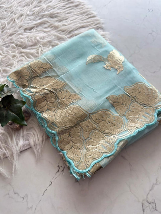 Beautiful semi organza saree with gold zari pitta work border and scalloped edges