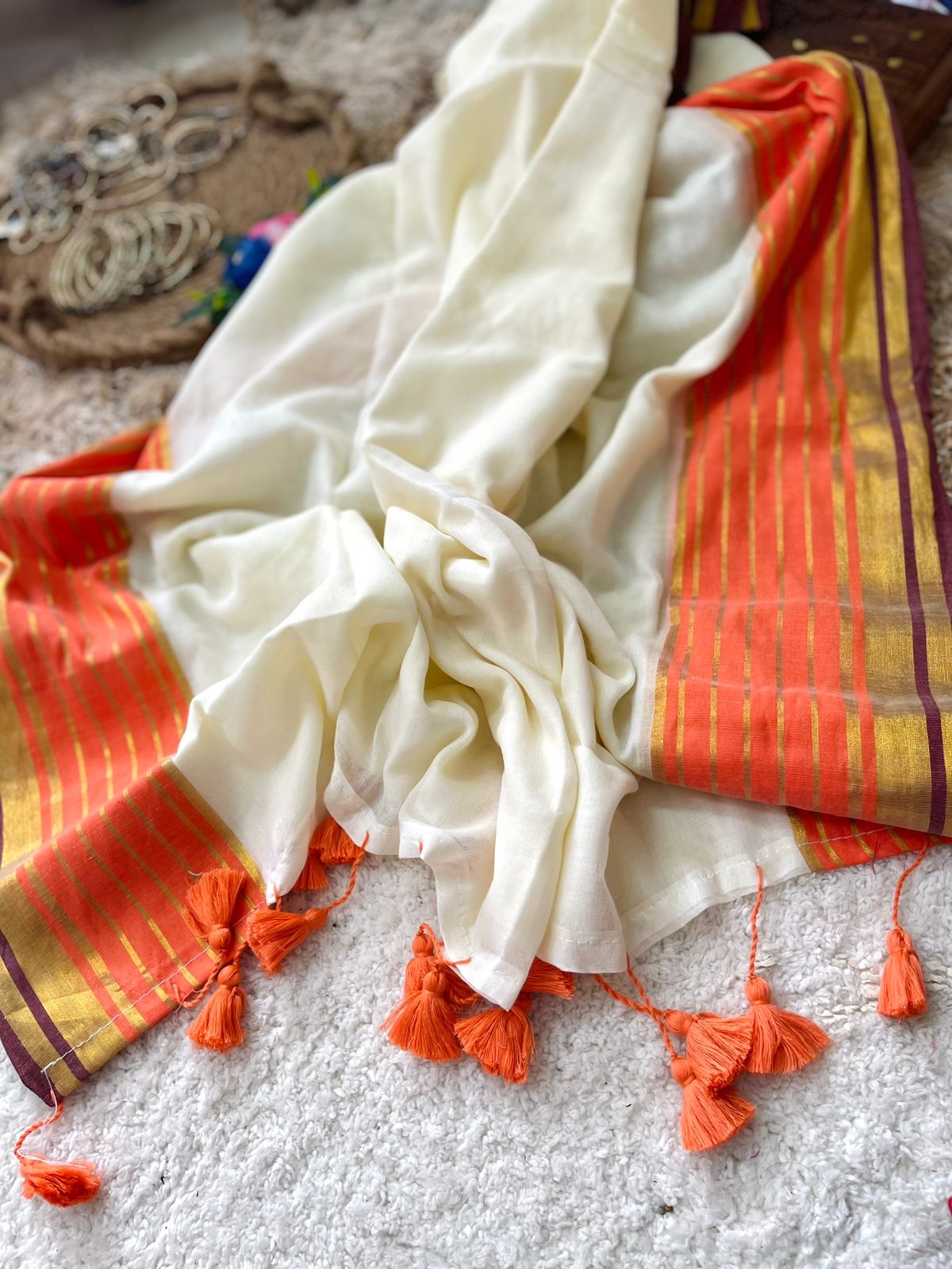 Premium pure mul cotton saree with orange and brown zari border