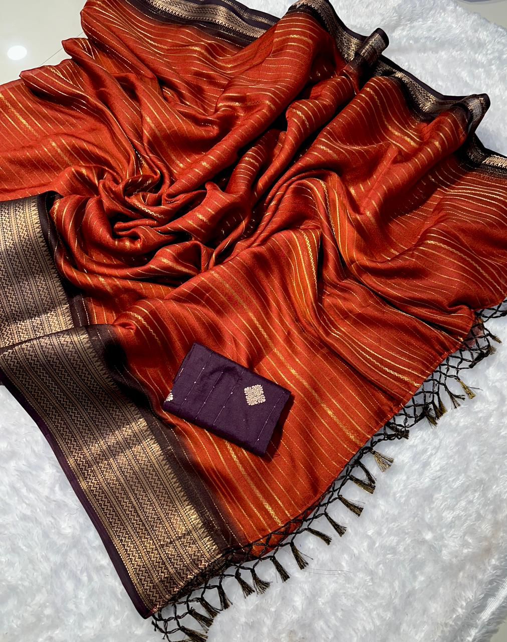 Beautiful semi dola silk saree in rust orange and brown