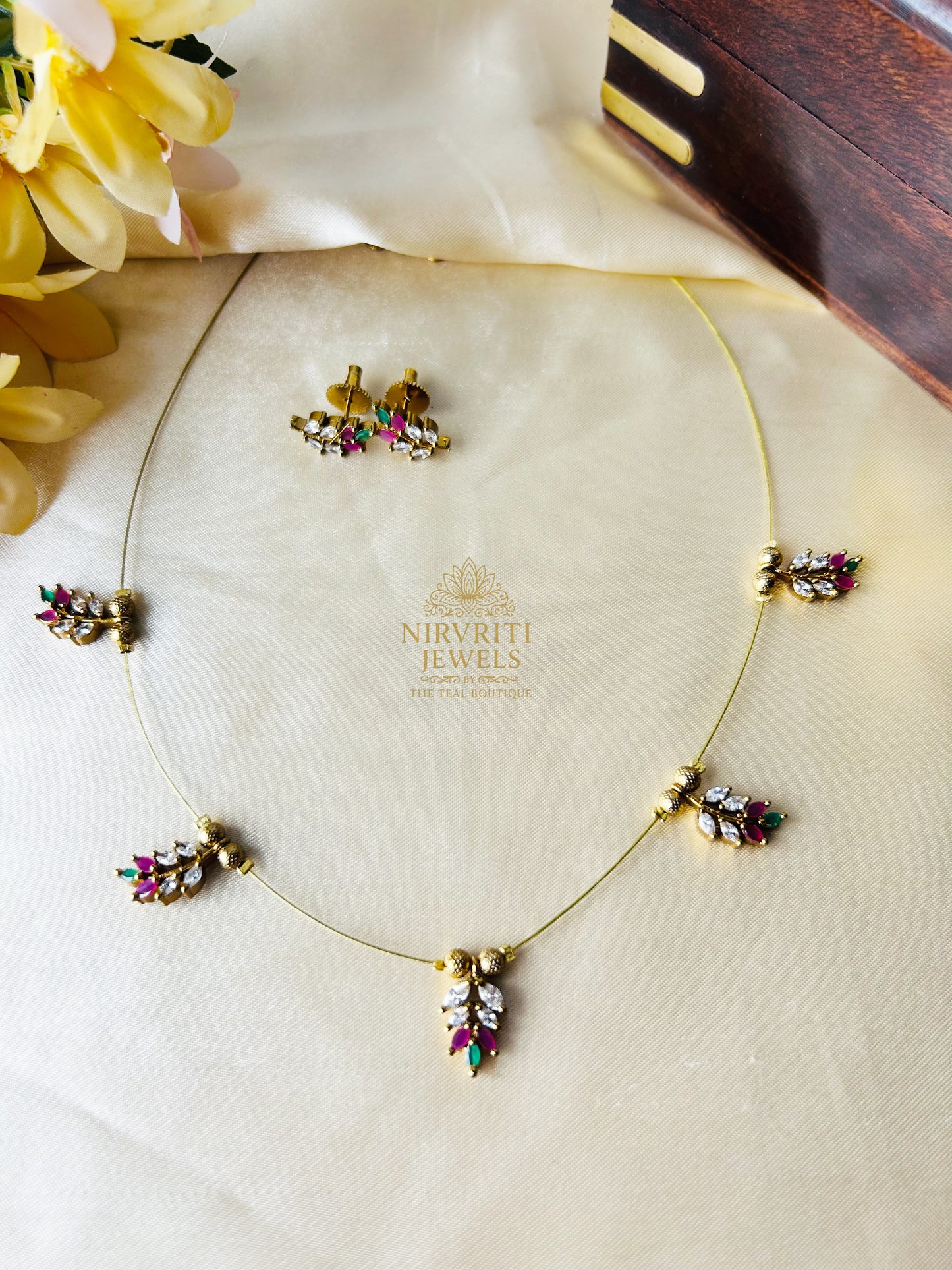 Invisible AD leaf chain with red/green/white stones