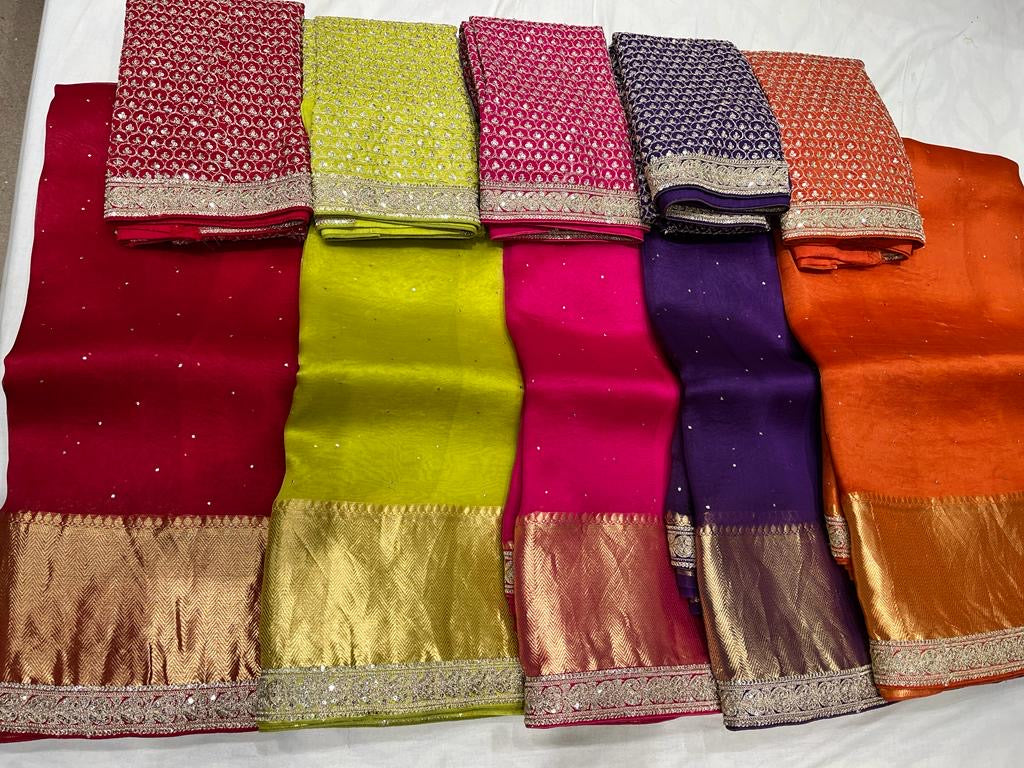 Pure organza saree with kanchi zari border and heavy blouse