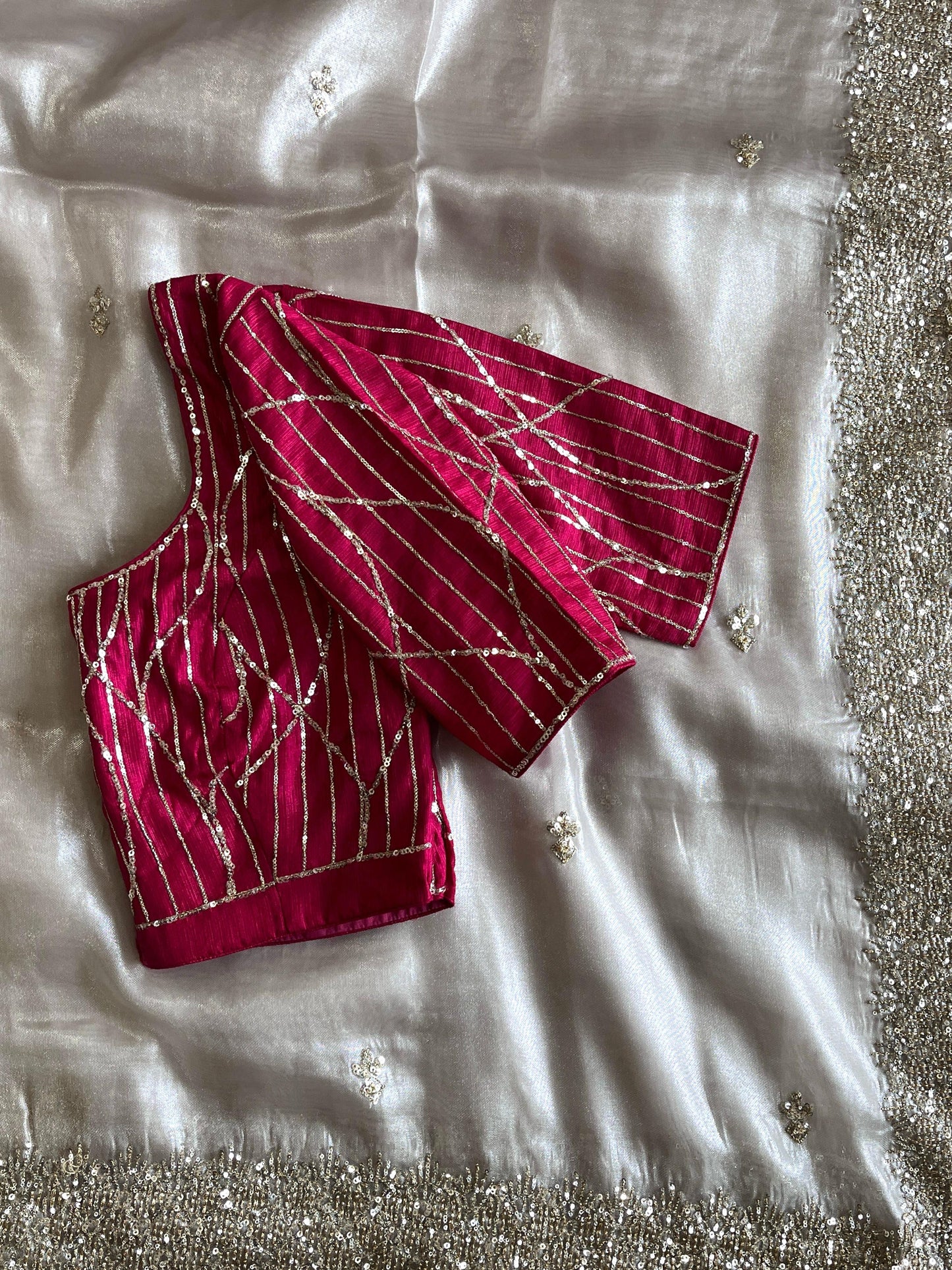 Silver tissue saree with handwork and pink blouse