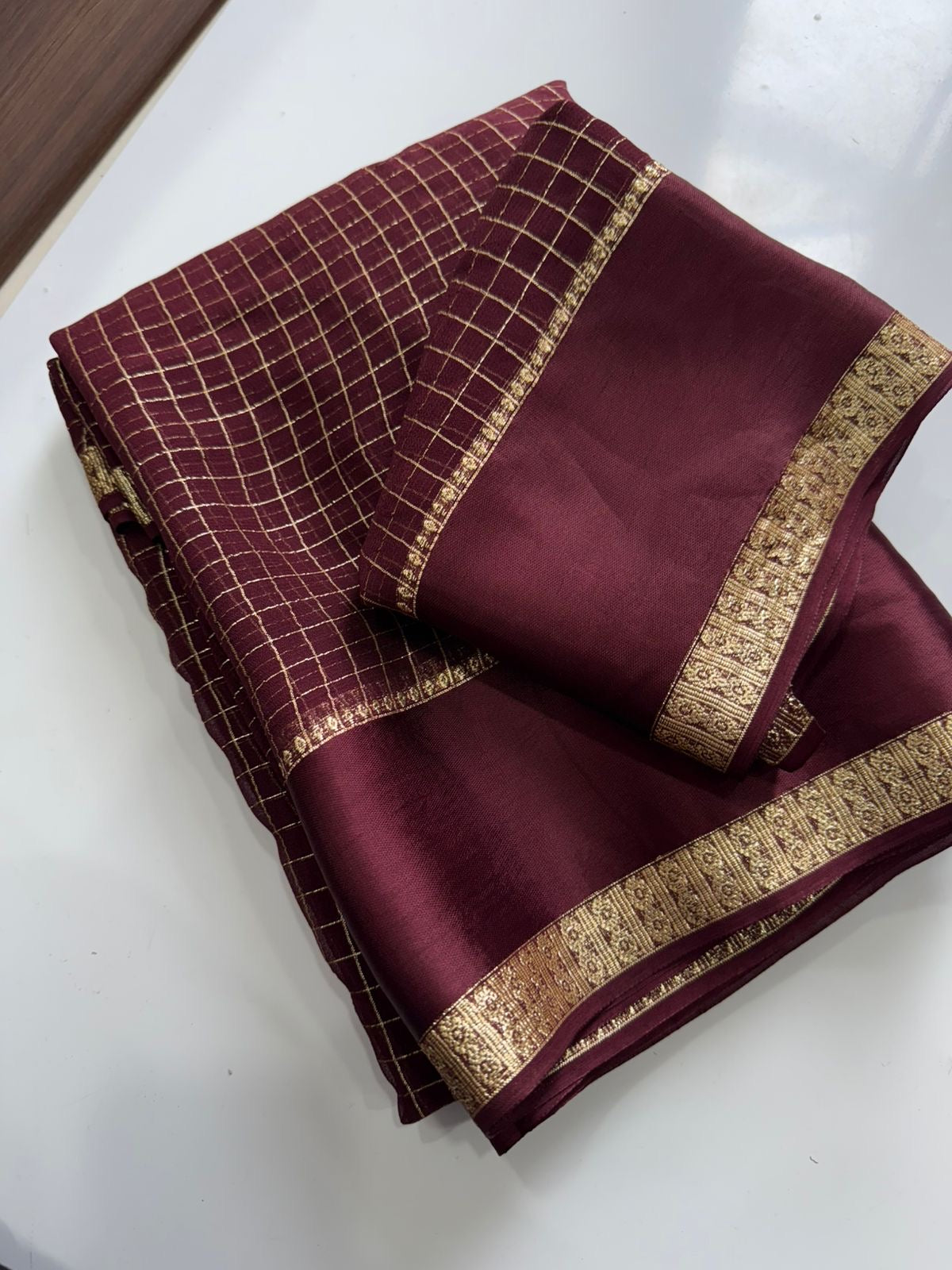 Beautiful viscous georgette saree with checks body and running blouse
