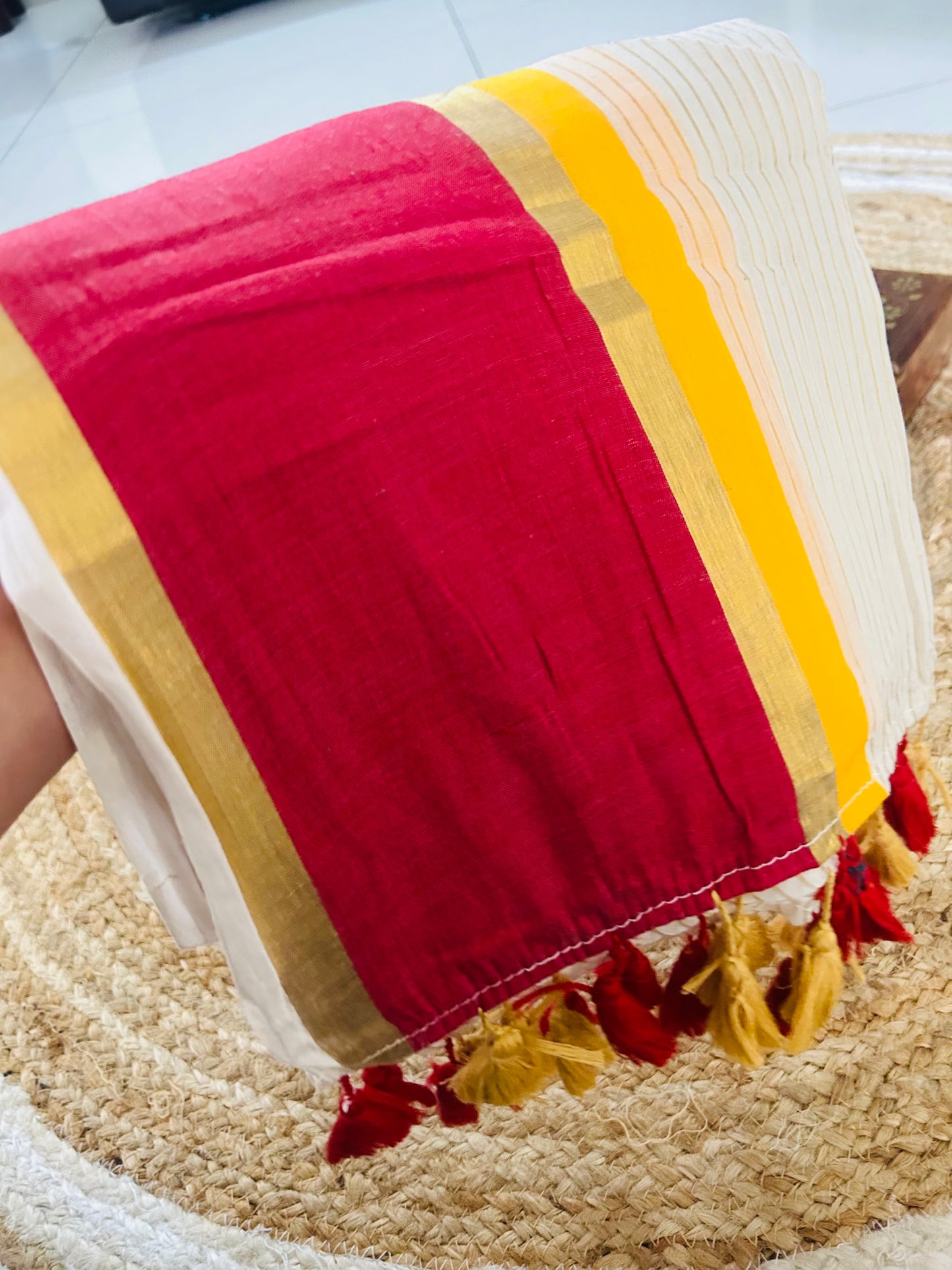 Pure and authentic mul cotton saree with zari stripes all over body and red yellow border