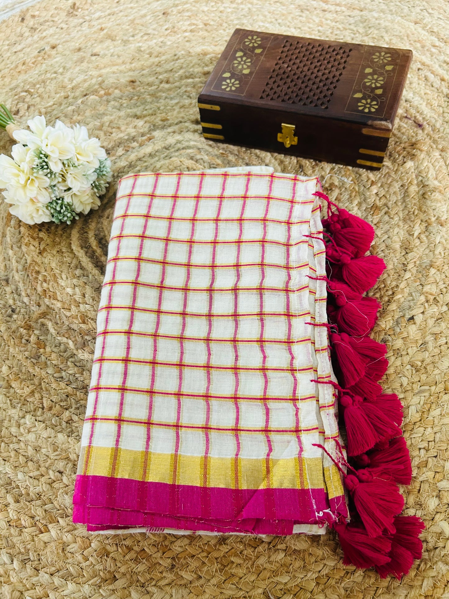 Pure and authentic mul cotton saree with pink zari checks and small border