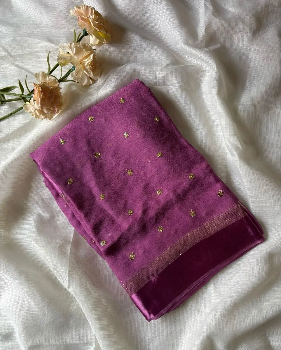 Viscous georgette with satin borders and round sequins buttas