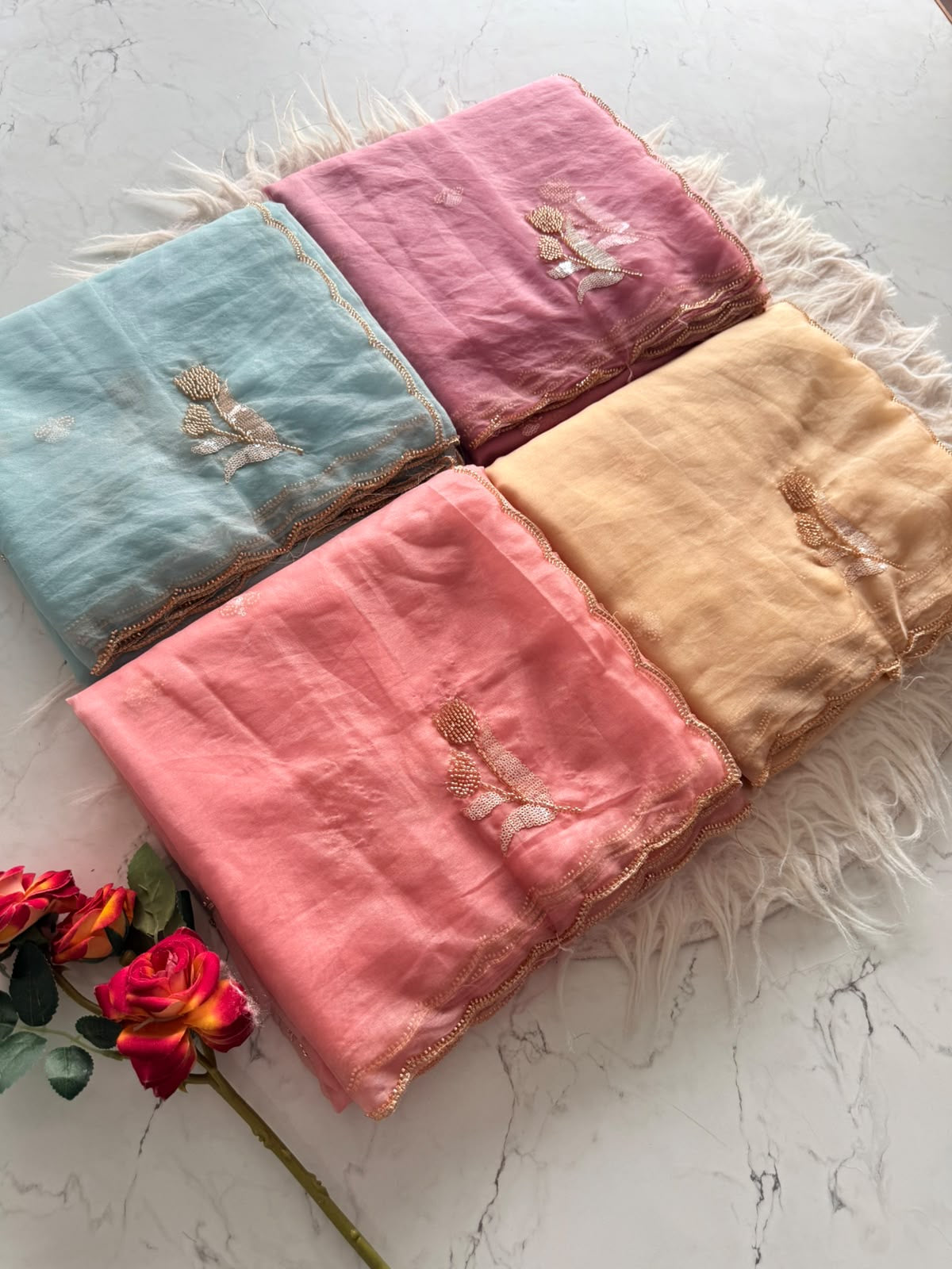 Premium semi tissue organza saree with beautiful cutdana work