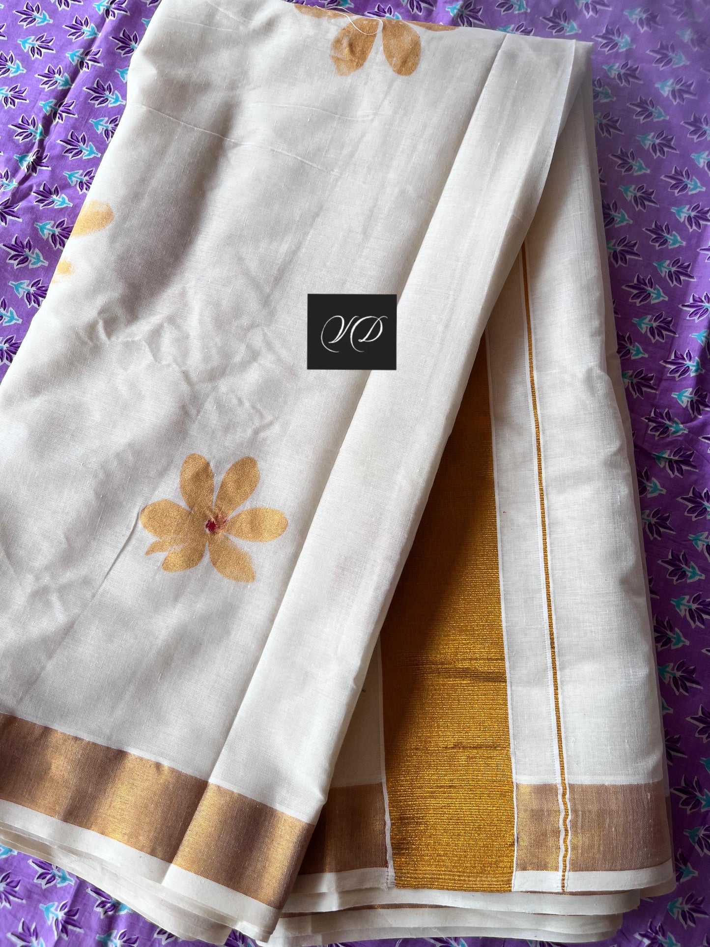 Kerala cotton saree with gold flowers
