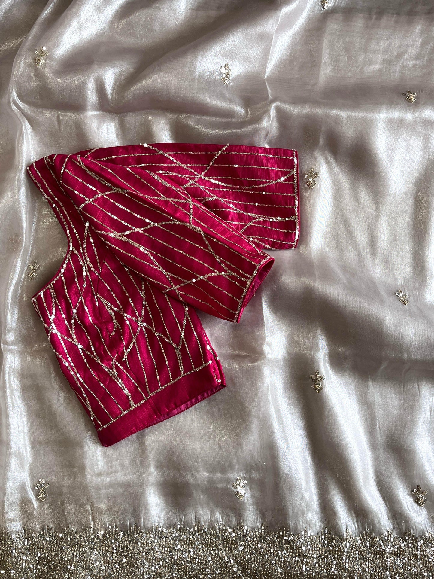 Silver tissue saree with handwork and pink blouse