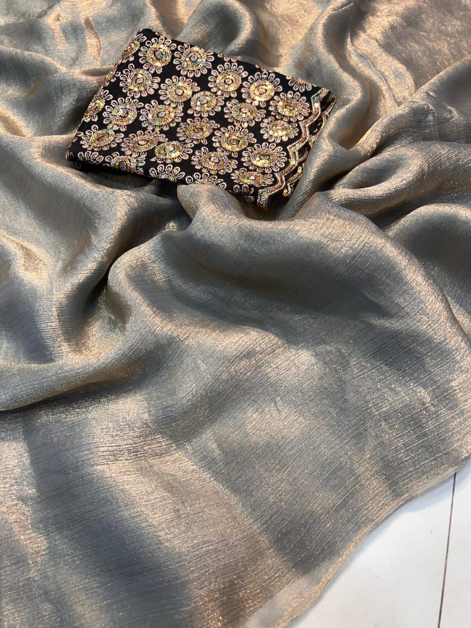 Shimmer chiffon saree with embroidered contrast blouse