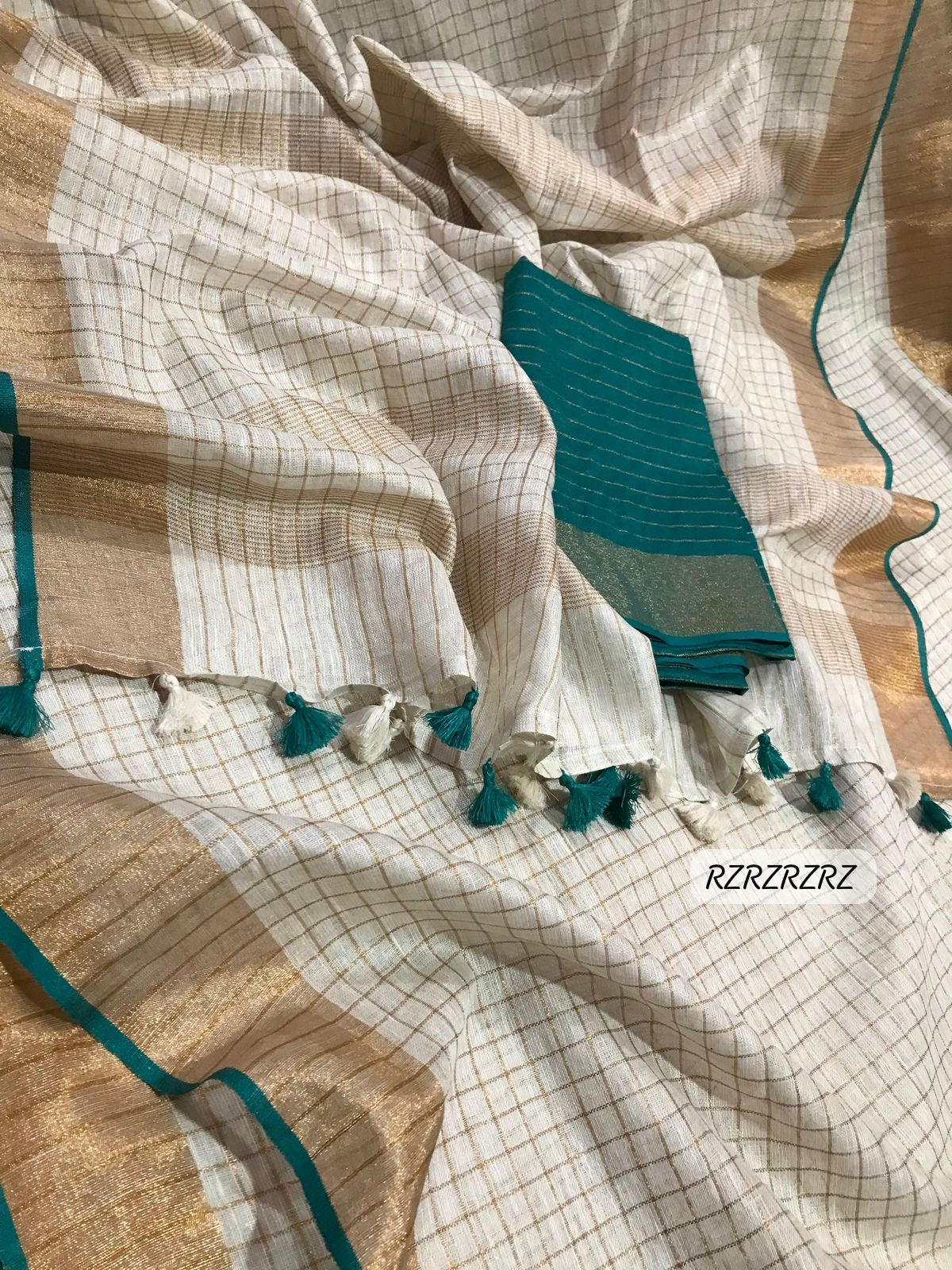 Pure linen checks saree with contrast blouse