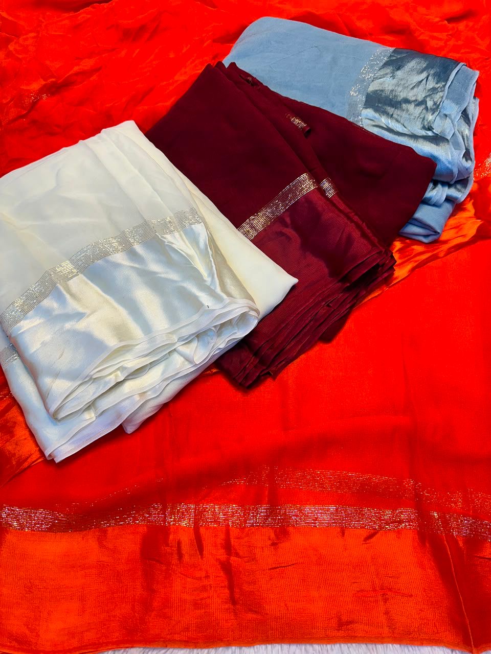 Beautiful viscous plain georgette saree with satin border and running blouse