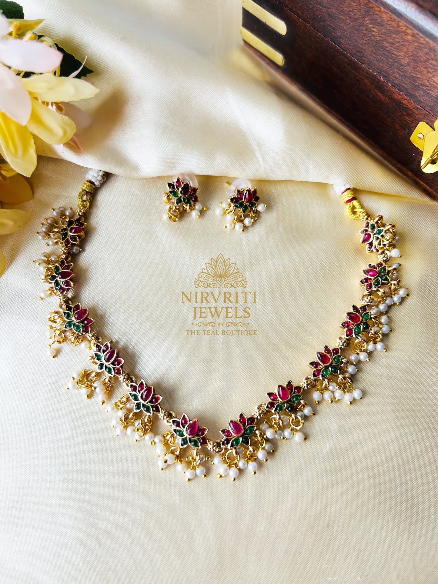 Lotus charm necklace with pearl beads