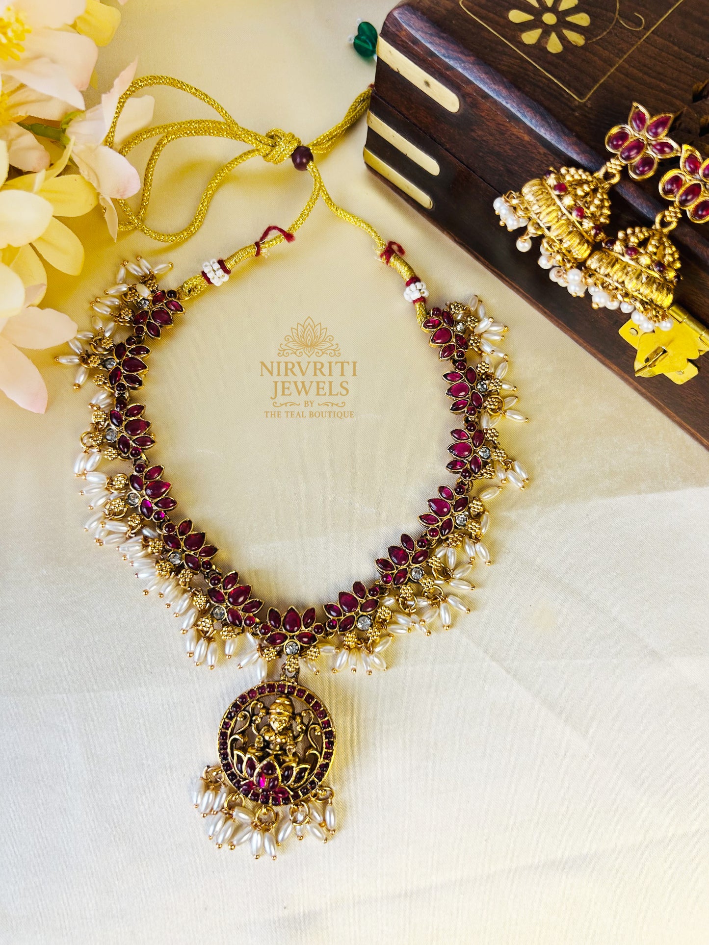 Beautiful lakshmi pendant lotus necklace with rice pearls - ruby