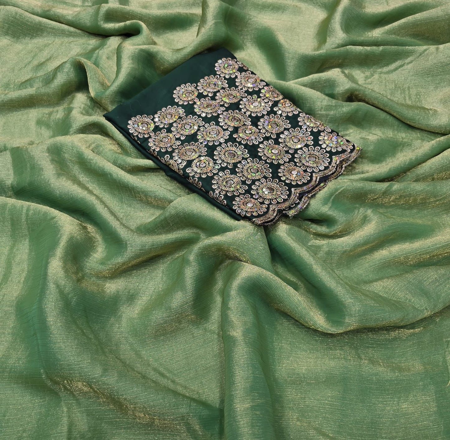 Shimmer chiffon saree with embroidered contrast blouse