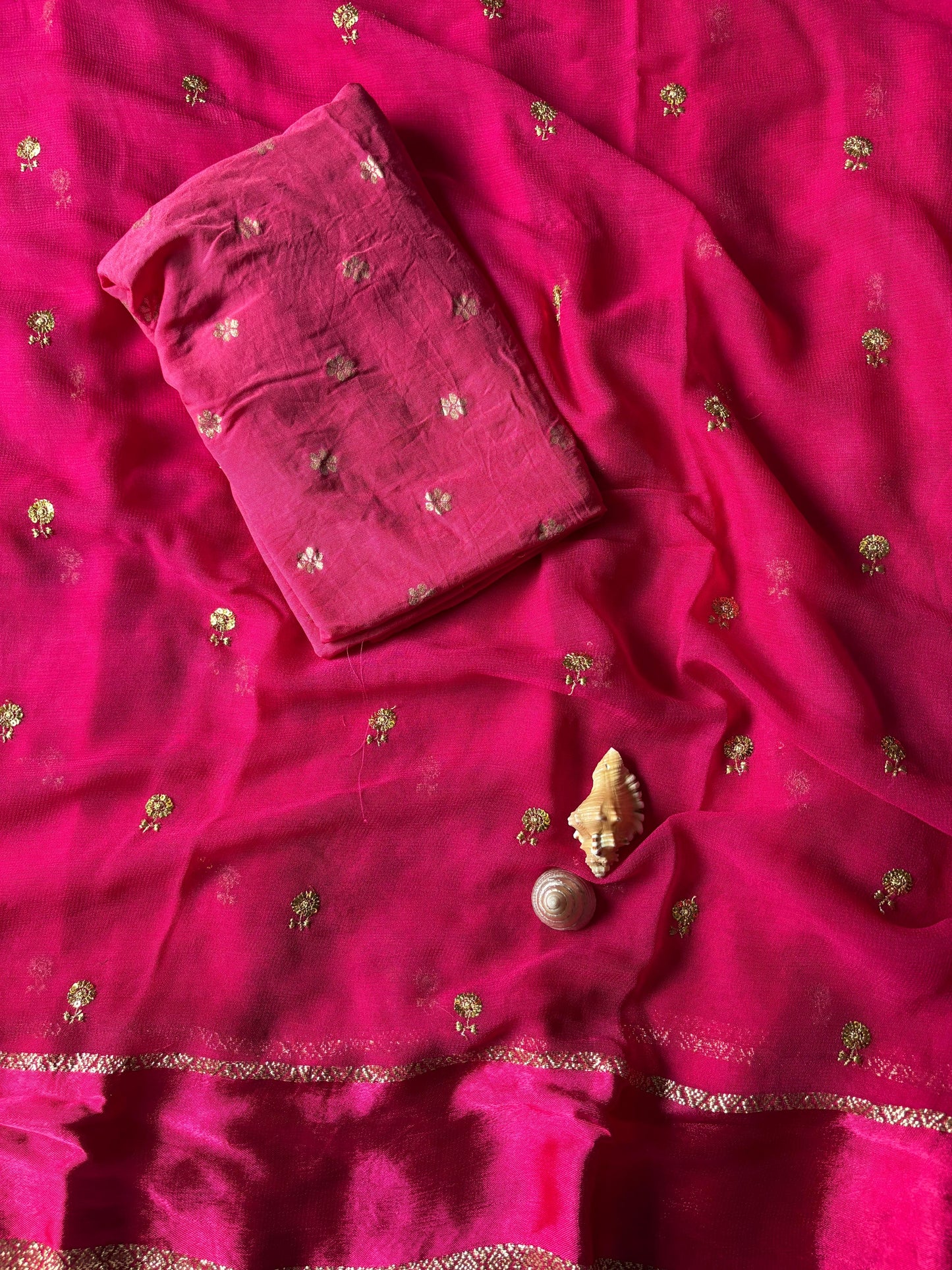 Pure georgette viscous saree with rich satin border and tiny flower buttas