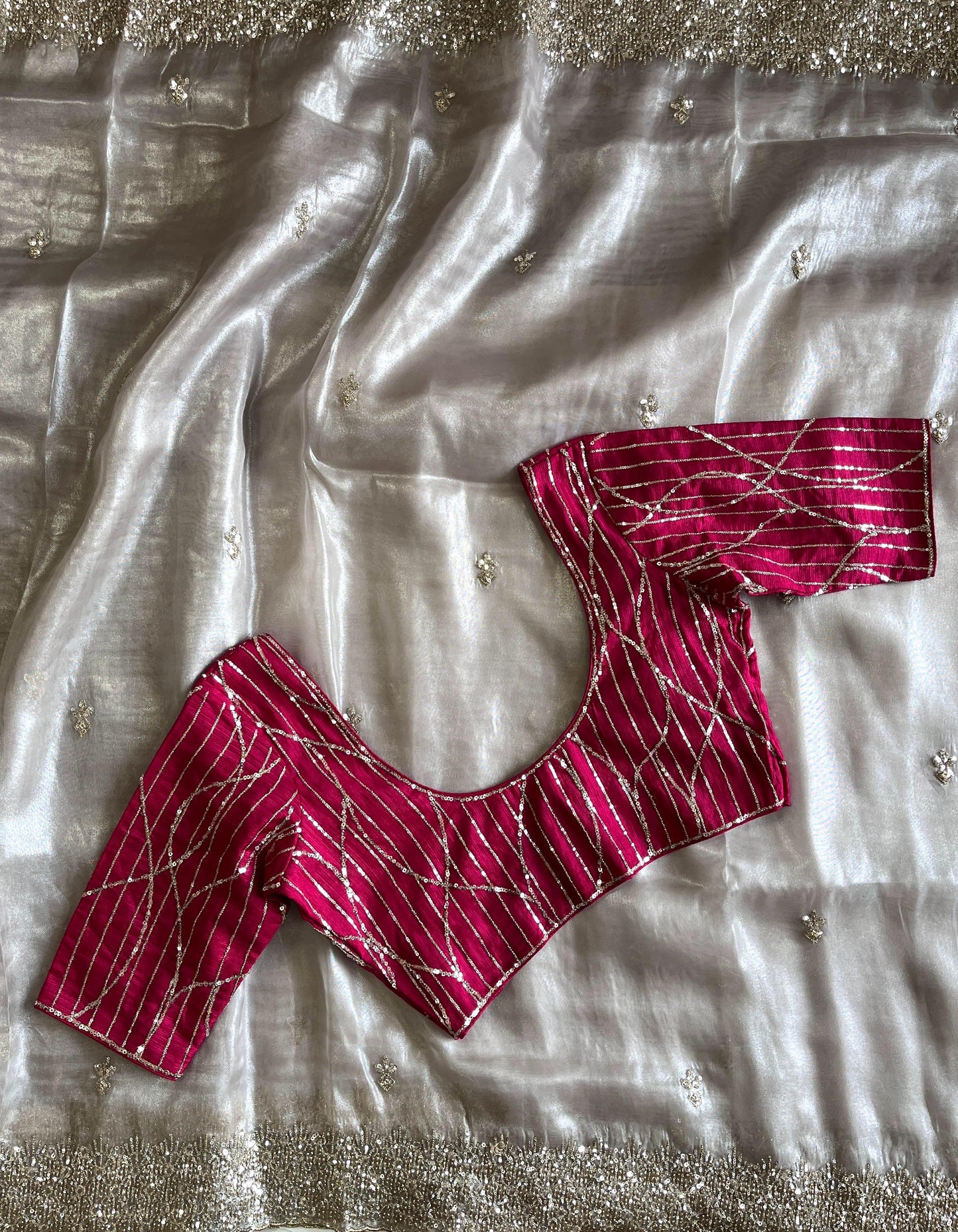 Silver tissue saree with handwork and pink blouse