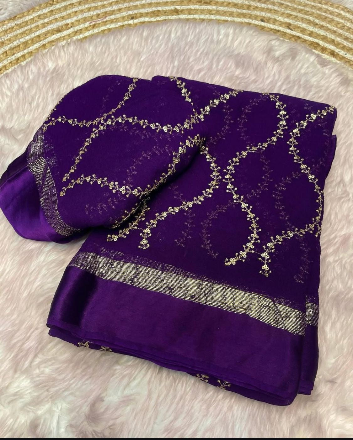 Viscous georgette saree with satin border and sequins embroidery