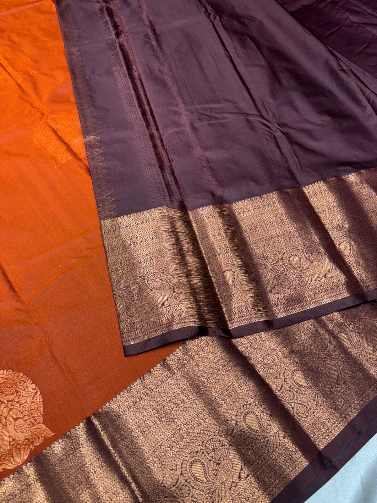 Beautiful premium rust orange semi silk saree with copper zari border
