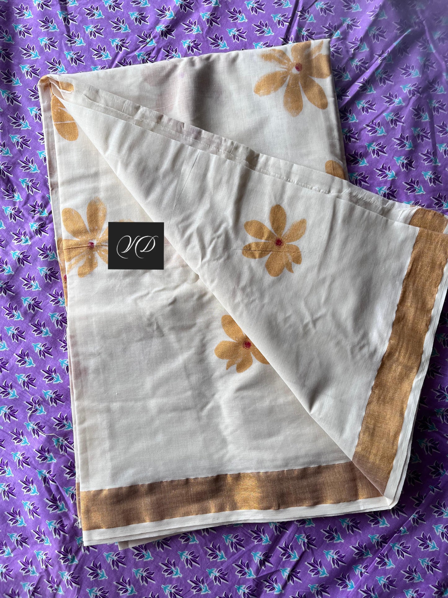 Kerala cotton saree with gold flowers