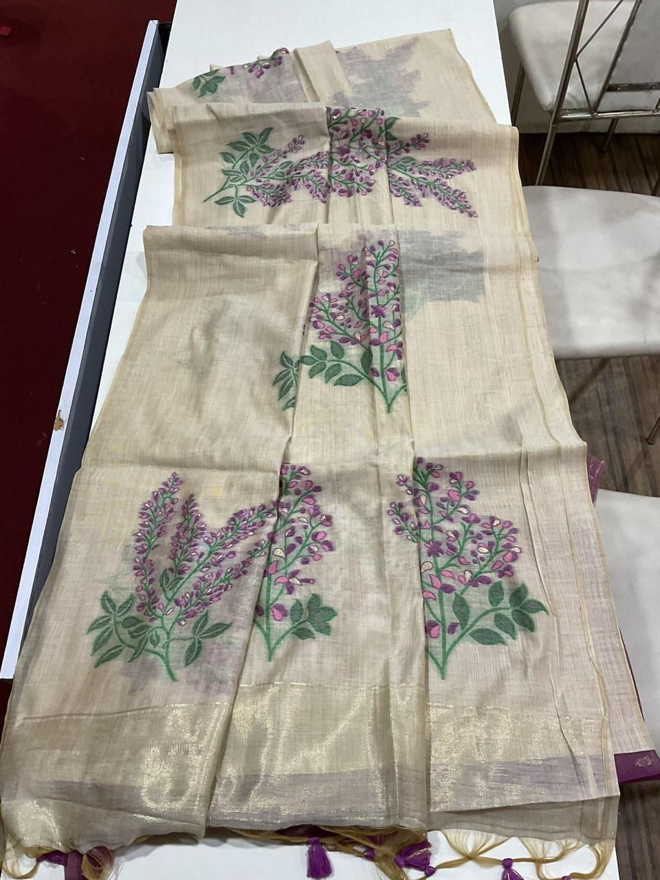 Soft off white muga cotton saree with floral weavings
