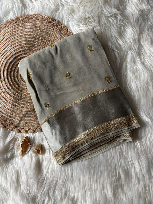 Pure georgette viscous saree with rich satin border and tiny flower buttas