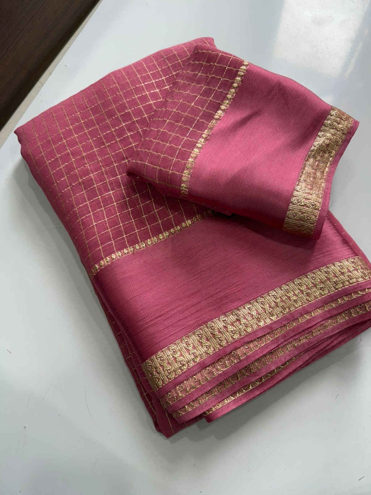 Beautiful viscous georgette saree with checks body and running blouse