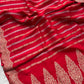 Pure banarasi munga silk saree with zari stripes and scalloped border
