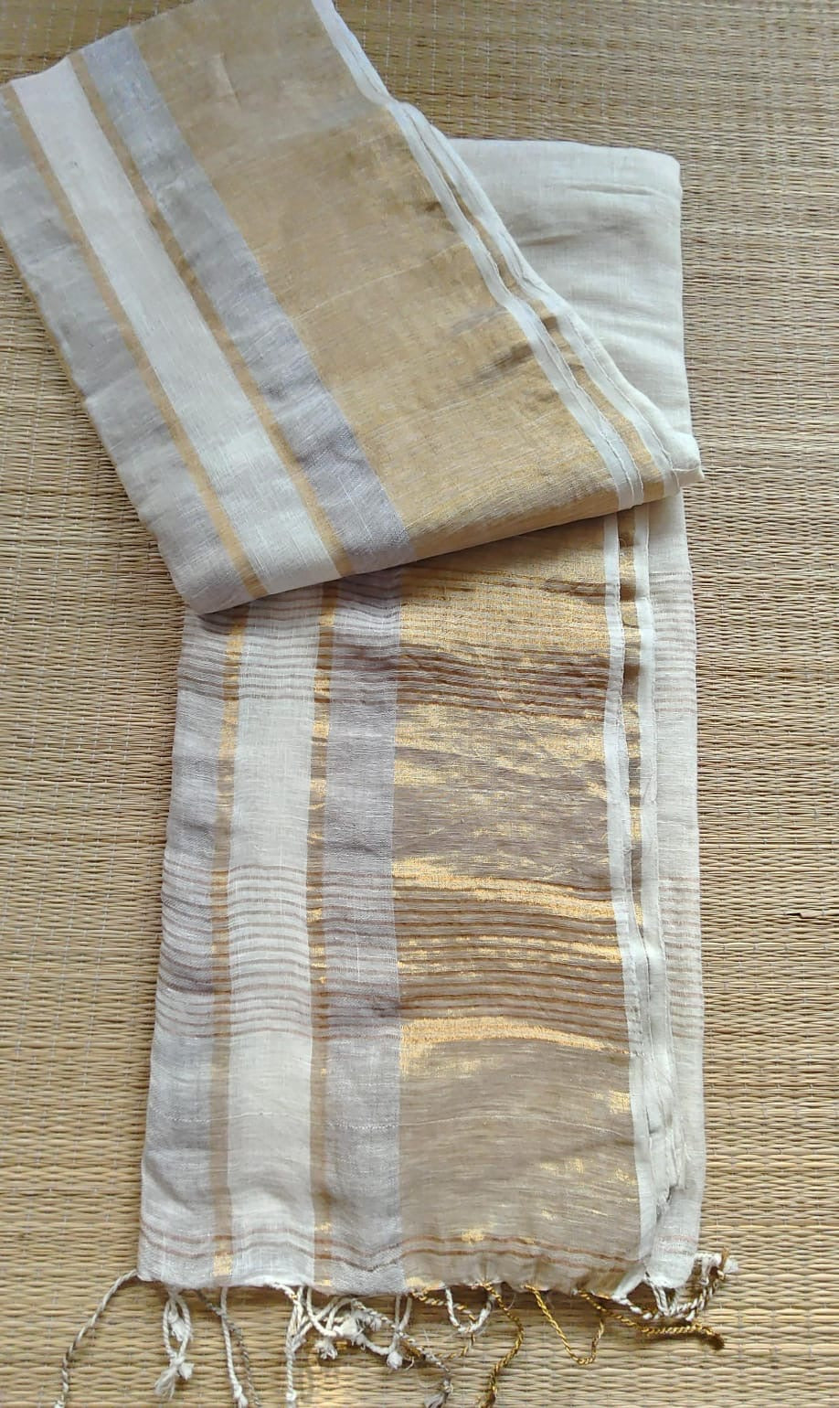 Pure handwoven linen saree with zari borders