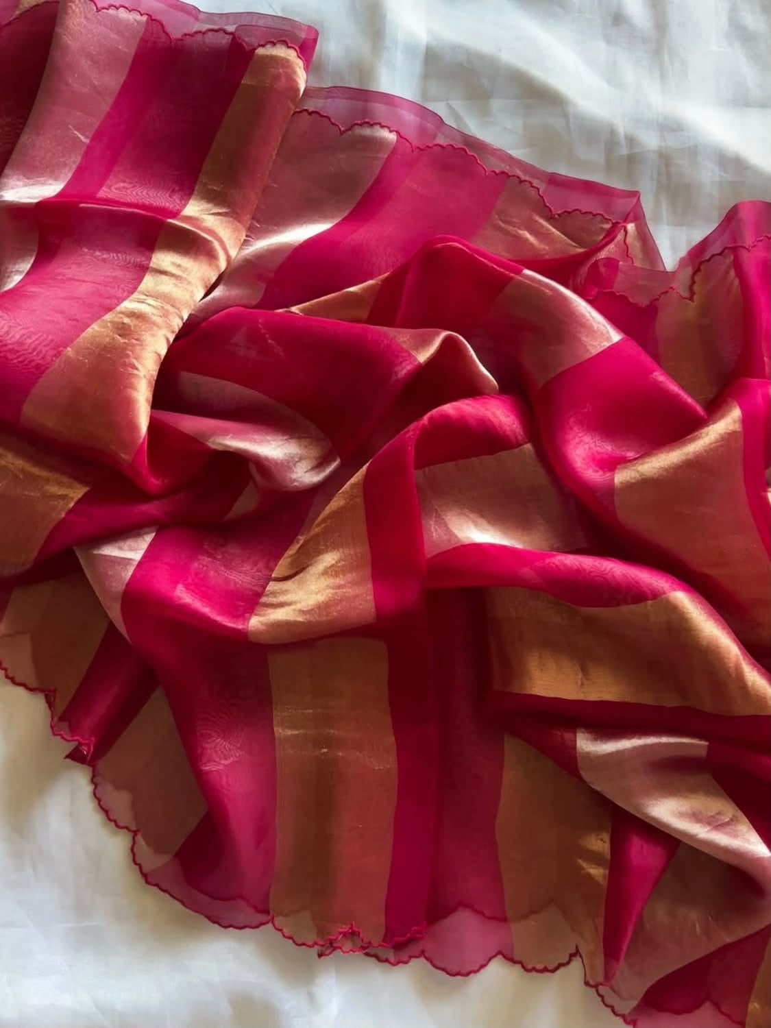 Beautiful georgette tissue silk saree with gold and silver tissue patta