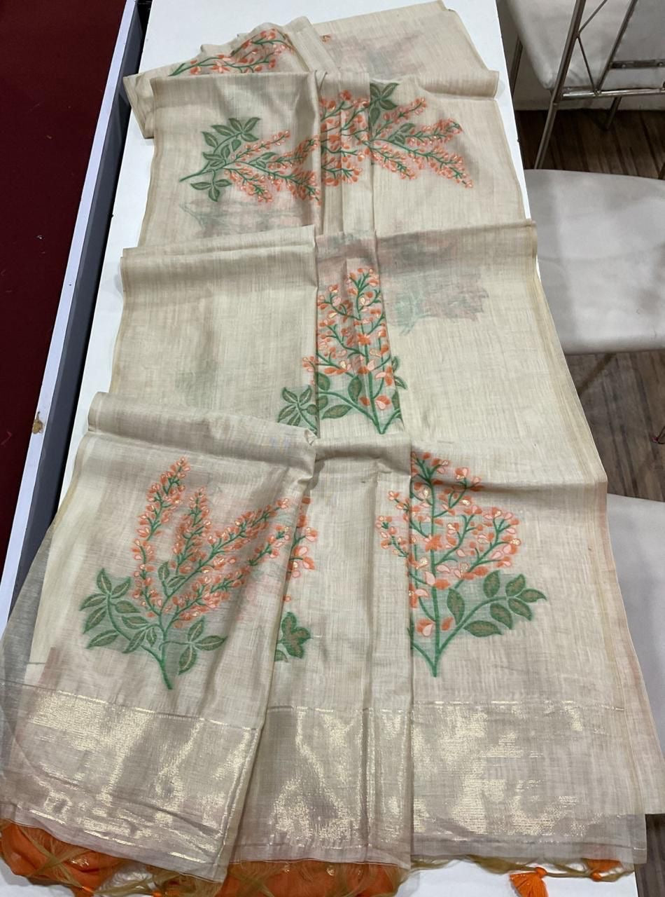 Soft off white muga cotton saree with floral weavings