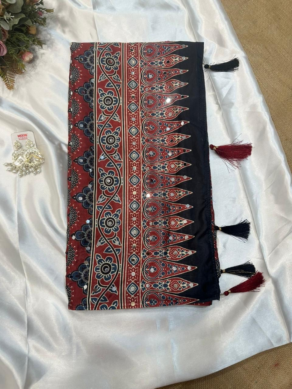 Beautiful semi crepe silk saree with ajrakh prints and mirror work