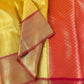 Banarasi tissue kanchi style yellow saree with contrast red border