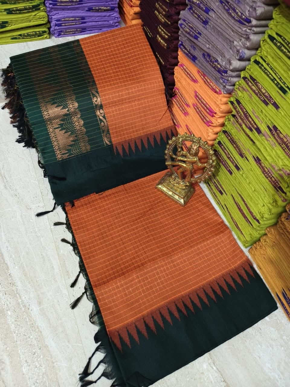 Gorgeous checked silk cotton sarees with solid temple border
