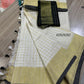 Pure linen checks saree with contrast blouse