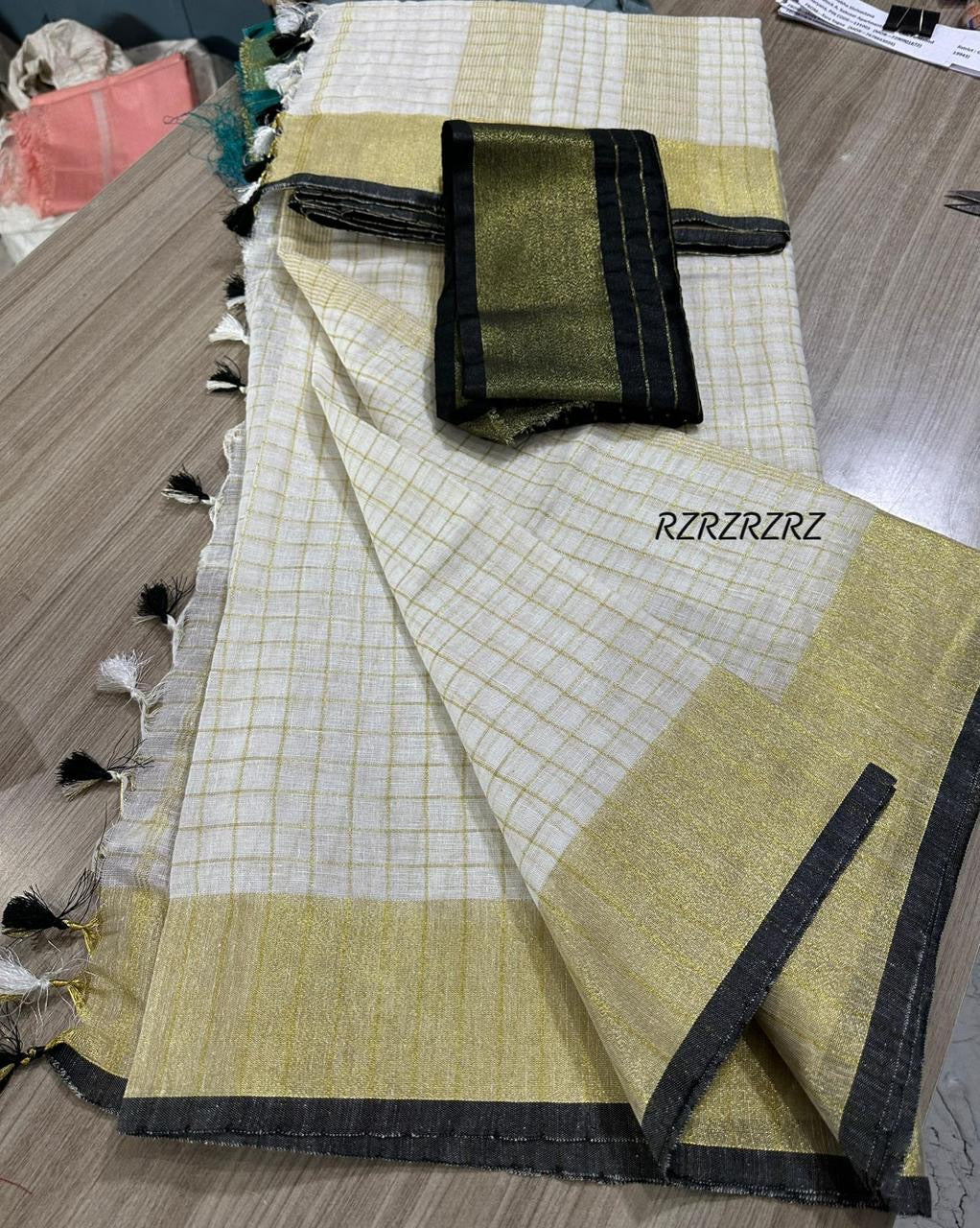 Pure linen checks saree with contrast blouse