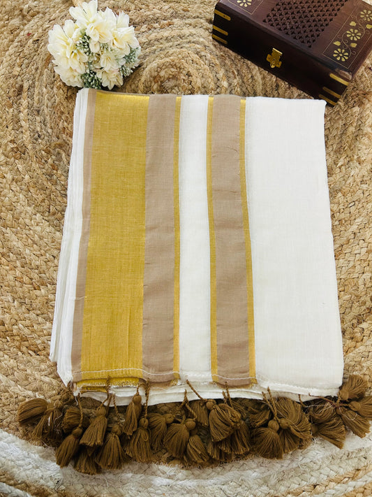 Pure and authentic mul cotton saree with light brown zari border and matching tassels