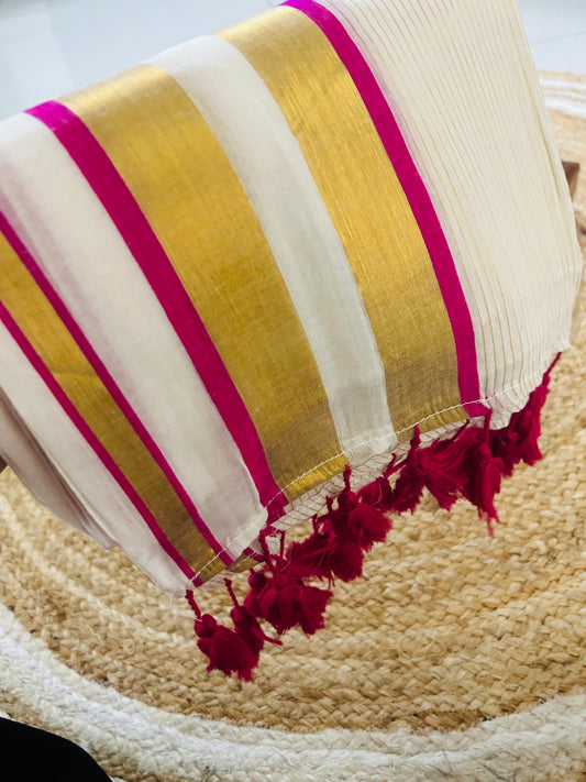 Pure and authentic mul cotton saree with zari stripes all over body and pink zari border
