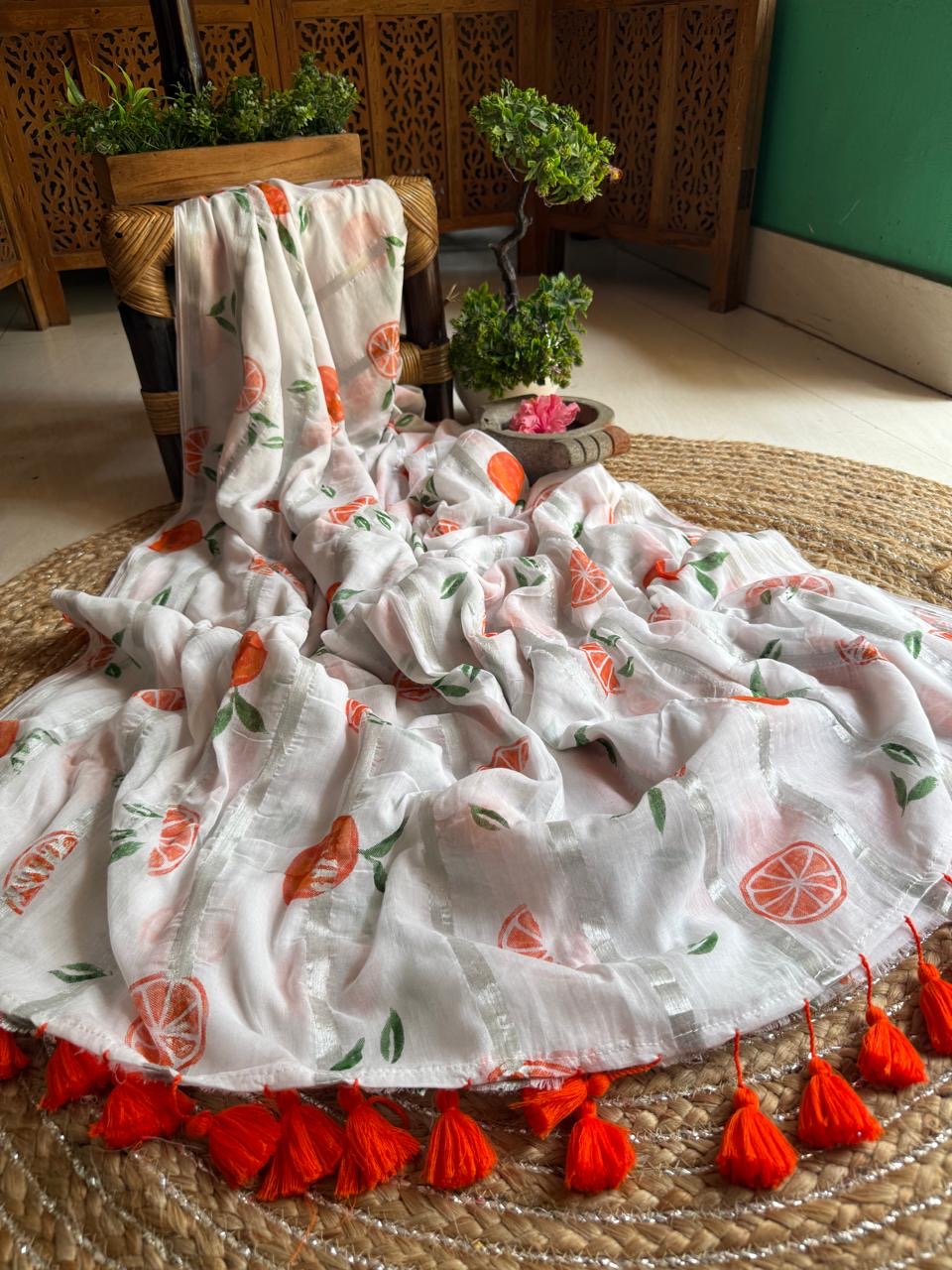Pure mul cotton saree with cute prints and silver zari stripes