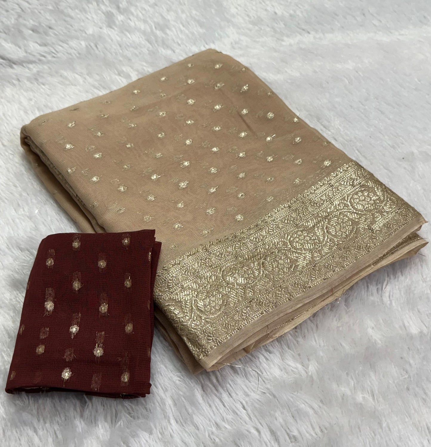 Soft Viscous georgette saree in beige shade with small beautiful jacquard buttas and contrast blouse