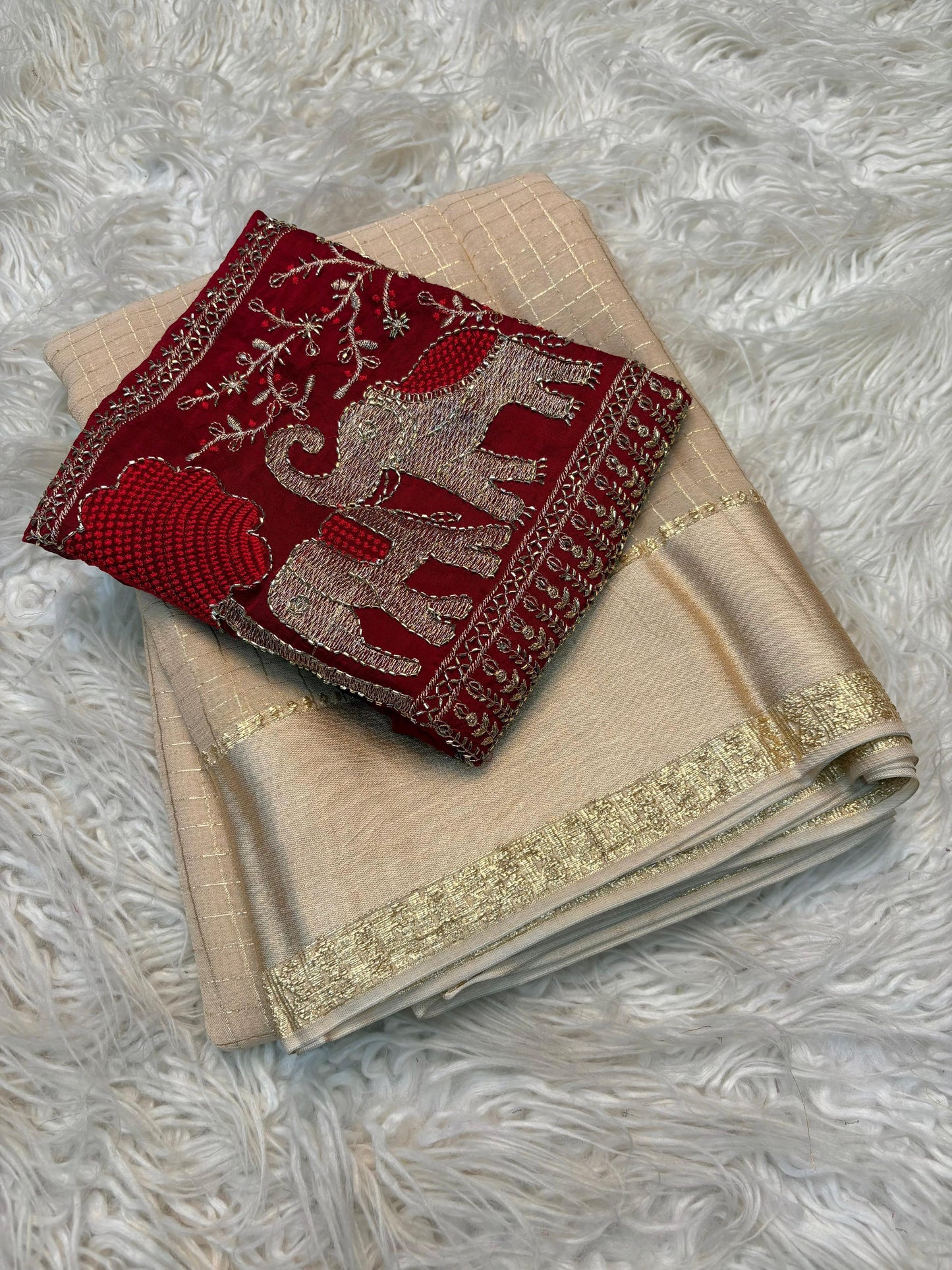 Beautiful viscous georgette checks saree in beige and red elephant blouse
